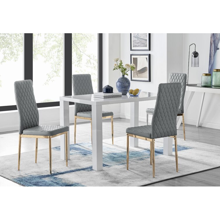 Eubanks High Gloss 4 Seat Rectangular Dining Table Set with Faux Leather Upholstered Dining Chairs